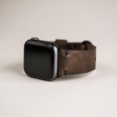 CONSTRUCTION• Handmade Apple watch band in Horween Leather: English Tan, Brown Nut, and Black Dublin• Simple stitching in black waxed polyester thread• Includes attached Apple watch adapters in black (Space Black) and polished silver (Stainless) • Brass PVD (matte black) buckle• Handmade in our North Carolina workshopSPECS • Available in 44mm/42mm and 40mm/38mm for Series1-6 Apple Watch• Sized to fit wrists 6.5" - 8.25"• For men or womenABOUT OUR PROCESSWe start with 5-5.5oz Horween leather and Adjustable Waxed Finish Apple Watch Band For Everyday Use, Leather Apple Watch Band For Everyday Use, Adjustable Apple Watch Band With Waxed Finish For Everyday, Everyday Leather Rectangular Apple Watch Band, Business Leather Apple Watch Band, Brown Adjustable Apple Watch Band For Everyday, Adjustable Leather Apple Watch Band With Wrist Strap, Handmade Brown Leather Apple Watch Band, Apple Font