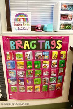 a bulletin board with pictures and magnets on it in front of a window that says brag tags