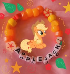 a pony beaded bracelet with the word applejack on it