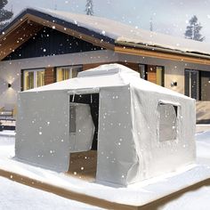 an outhouse is covered in snow outside