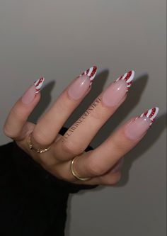 Kylie Jenner Christmas Nails, Santa Almond Nails, Almond Shaped Nails Designs Christmas, French Candy Cane Nails, Almond Candy Cane Nails, Christmas Nails Stiletto Simple, Christmas Nail Sets Almond, Christmas Nails Sharp, Reflective Christmas Nails