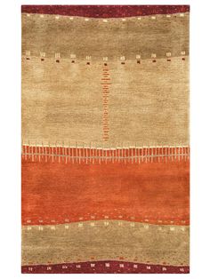 an orange and beige rug with red accents