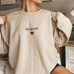 The minimalist "For Good" design is perfect for those looking for a simple yet elegant style! Ideal for Wicked musical fans or anyone seeking a personal and meaningful touch, this piece is great for everyday wear or as a thoughtful gift. Product Features: High Quality: Made from soft, durable fabric, perfect for everyday comfort. Minimalist Design: Features the phrase "For Good" with a delicate heart, offering a simple yet meaningful graphic. Size Options: Available as a hoodie, sweatshirt, or s The Cool Aunt, Cold Sweatshirt, Cool Aunt, King Shirt, Club Sweatshirts, Nurse Sweatshirt, Christian Sweatshirt, Korean Casual, Womens Fleece