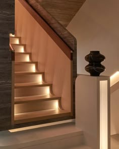 the stairs are lit up with leds in this modern interior design by aten architecture