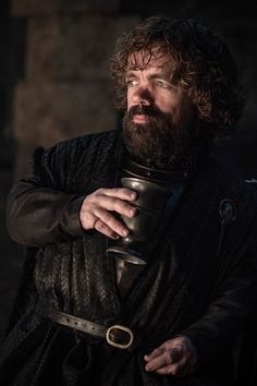 game of thrones'jon arm is holding a cup