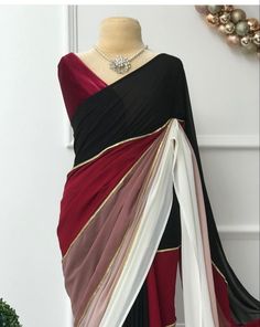 Package Contains: Saree, Blouse, Petticoat Fabric: Original Soft Georgette with digital print  (5.5 m)  Work: - beautiful colors digital print with lace in saree    Blouse: - Satin silk (0.80 m) With FREE Saree fall and Pico with matching petticoat. Our Services- Stitching service is also available on customer demand. Please get in touch with us for Stitching Service. We customize everything when it comes to ethnic wear. We Provide both i.e. unstitched and stitched blouse as required, so feel fr Elegant Multicolor Draped Dress, White Traditional Drape Blouse For Formal Occasions, Elegant White Draped Saree, Elegant Red Draped Blouse Piece, Fitted Chiffon Blouse With Traditional Drape, Elegant Red Blouse Piece For Evening, Elegant Red Blouse For Evening, Elegant Red Evening Blouse Piece, Elegant Multicolor Blouse Piece For Festive Occasions