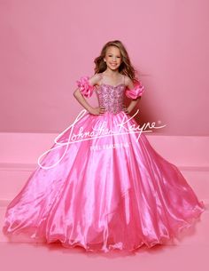 Dazzle on stage with the Sugar Kayne C359 pageant ballgown dress. Featuring a sweetheart neckline, puff sleeves, and spaghetti straps, this dress will make you stand out. With an embellished bodice and a glitter tulle and organza long skirt, you'll sparkle and shine like a true pageant queen. Colors: Capri Blue, Rose Pink, White Sizes: 2-16 Pageant Dresses For Kids, Pagent Dresses, Pageant Queen, Ballgown Dress, Kids Pageant Dresses, Glitz Pageant, Girls Pageant Dresses, Pageant Dress, Dresses 2024