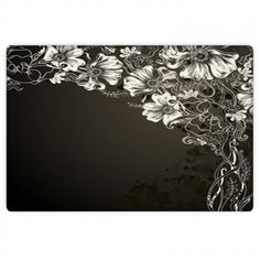 a black and white floral design on a mouse pad