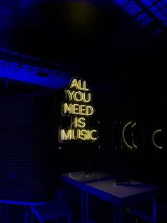 all you need is music neon sign in dark room