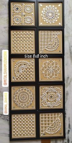 four different types of decorative tiles on display