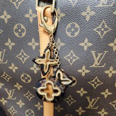 Excellent Used Condition Louis Vuitton Bag Charm, Keychain. Unique And Elegant! Minor Scratches On Hardware And Some Fading Throughout As A Sign Of Use. Please Refer To Pictures And Video For Full Details. Lv Bag Charm Louis Vuitton, Authentic Louis Vuitton Bags, Louis Vuitton Accessories, Charm Keychain, Authentic Louis Vuitton, Vuitton Bag, A Sign, Brown Gold, Louis Vuitton Bag