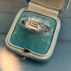 For Sale on 1stDibs - Van Cleef & Arpels diamond emerald-cut engagement ring. Set to centre with a rectangular emerald-cut diamond, F colour, VS2 clarity, with a weight of 3.41 1970s Van, Van Clef, Van Cleef Arpels Diamond, Ring Cuts, The Bling Ring, Bling Ring, Van Cleef & Arpels, Emerald Cut Diamond Ring, Emerald Cut Engagement