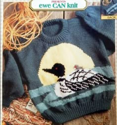 an image of a sweater with a bird on it