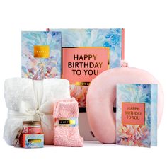 the birthday gift hamper is filled with pink items