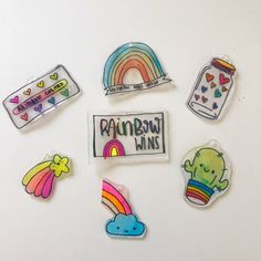 several stickers with rainbows and unicorns are on a white surface next to each other