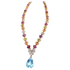 Bochic "Capri” Amethyst, Topaz, Citrine & Peridot Necklace in 18K & Silver Green Peridot - 5 Carats Blue Topaz pear shape drop - 7 Carats Citrine - 4 Carats Purple Amethyst - 4 Carats Rodholite - 4 Carats The Bochic "Capri" Opal & Multi Fancy Gems Necklace is Set in 18K Gold & Silver is a stunning piece of jewelry designed for versatility and elegance. It features natural gems cabochons weighing 36 carats, showcasing pink, blue, and cream tones. The Necklace also includes natural multi-color fan Art Deco Drop Earrings, White Topaz Necklace, Gems Necklace, Peridot Bracelet, Peridot Earrings, Peridot Necklace, Cream Tones, Topaz Necklace, Gem Necklace