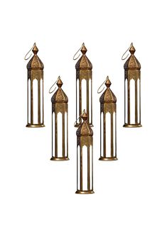 four brass - plated lanterns are shown against a white background