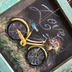 a painting of a yellow bicycle with flowers on it