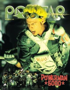 a magazine cover featuring a man with yellow hair and goggles