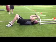 a man laying on top of a football field