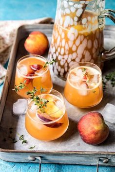 three glasses of peach tea on a tray