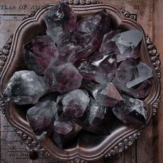 a bowl filled with lots of ice on top of a table