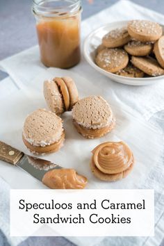 some cookies and peanut butter are on a table with a jar of caramel sauce