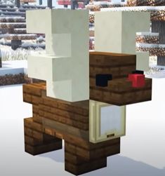 an animal made out of blocks in the snow