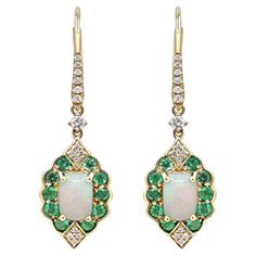 Decorate yourself in elegance with this Earring is crafted from 14-karat Yellow Gold by Gin & Grace. This Earring is made up of 5*7 Cushion-cut Ethiopian opal (2 Pcs) 1.30 carat, 2.0 round-cut Emerald (20 pcs) 0.61 grams and Round-cut White Diamond (30 Pcs) 0.20 Carat. This Earring is weight 4.02 grams. This delicate Earring is polished to a high finish shine. Ethiopian Art, Emerald Earrings, Delicate Earrings, Jewelry Earrings Hoops, Cushion Cut, Ethiopian Opal, White Diamond, Gin, Round Cut