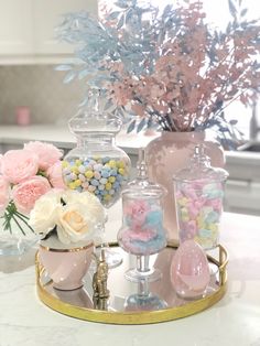 Spring flowers, Easter Decor, Pastels, candles, candy canisters, spring decor, kitchen island styling Pink Easter Decor, Easter Floral Decorations, Easter Inspiration Decor, Easter Decorating Ideas, Easter Kitchen Decor, Spring Floral Decor, Easter Crafts For Adults, Decorating Ideas For The Home