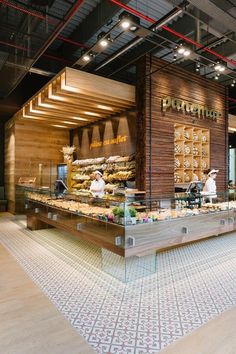 the inside of a restaurant with food on display