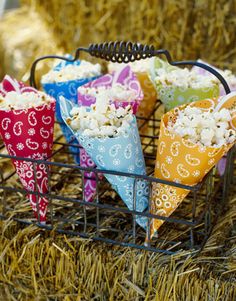 several different pictures with popcorn in them and some paper cones on the top of them