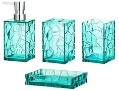 three pieces of glass soap dispenser and toothbrush holder