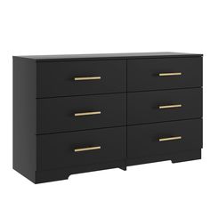 a black dresser with gold handles and drawers