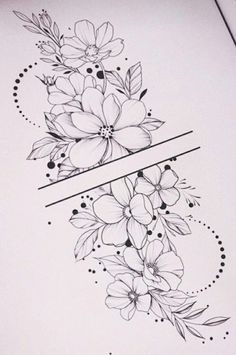 an open book with flowers on it and two lines in the middle that are black and white