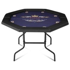 a black table with a blue cloth on the top and gold trimmings around it