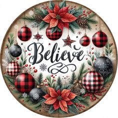 a wooden plaque with christmas decorations and the words believe on it's front door