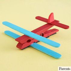 a website page with an image of a red and blue toy airplane on top of it