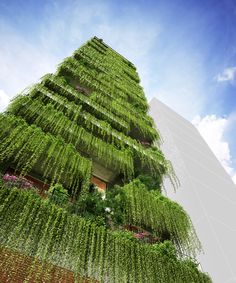 a tall building covered in lots of green plants