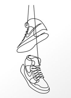 a pair of shoes hanging from a string with the word,'nike air force 1 '