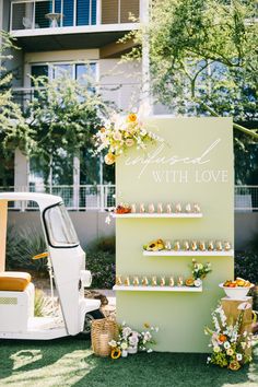 a vespa parked next to a sign that says married with love on it