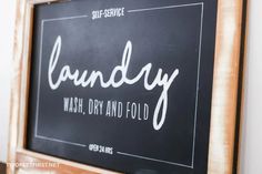 a black and white sign that says laundry wash dry and fold on the side of a wall