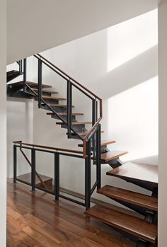 a stair case with green glass panels on it