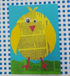 a paper cut out of a yellow bird on a blue and white checkered tablecloth