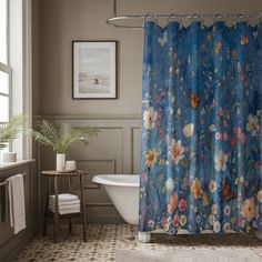 a bath room with a tub and a shower curtain