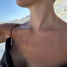 Our dainty and minimalist lariat y-necklace is made with shiny stainless steel chain. Our gorgeous chain dazzles so delicately, making it a perfect everyday wearing piece - and most importantly, will certainly not tarnish! You can wear this stunning piece everyday and not worry about taking it off for showers or water wear.  Wear with our BEST SELLING Hand Chain! - https://minkksi.etsy.com/listing/1036606761  (All items are sold separately)   Material: Stainless Steel Length: 20" inches necklace Dainty Gold Lariat Necklace, Long Dainty Necklace, Drop Chain Necklace, Drop Necklace Gold, Gold Drop Necklace, Gold Lariat Necklace, 20 Inch Necklace, Y Necklace, Necklace Minimalist