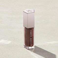 Shop Fenty Beauty's Gloss Bomb Universal Lip Luminizer. Gloss Bomb delivers explosive shine in one perfect rose nude shade handpicked by Rihanna herself. Fenty Face, Fenty Gloss, Fenty Beauty Gloss Bomb, Travel Skincare, Lip Liners, Lip Shine, Beauty Games, Matte Foundation