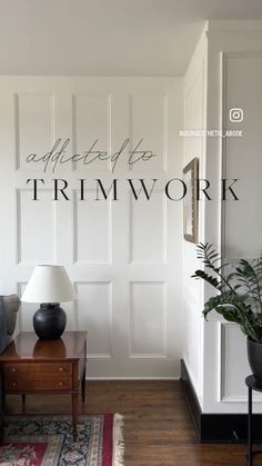 a living room with the words coffee to trim work written on the wall above it