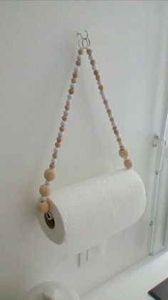 a roll of toilet paper hanging from a wall