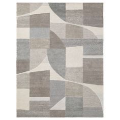 a gray and white rug with different shapes on the floor, including squares and rectangles